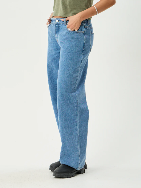 Afends Alyra low rise wide leg women's denim jeans with a relaxed fit.