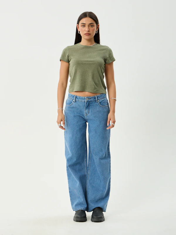 Afends Alyra low rise wide leg women's denim jeans with a relaxed fit.