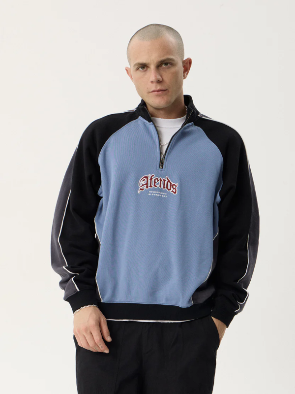 Afends Occupancy Paneled Quarter Zip Jumper unisex heavyweight fleece with a relaxed fit and quarter zip design.