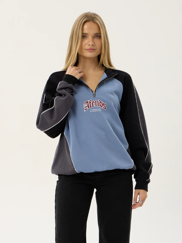 Afends Occupancy Paneled Quarter Zip Jumper unisex heavyweight fleece with a relaxed fit and quarter zip design.