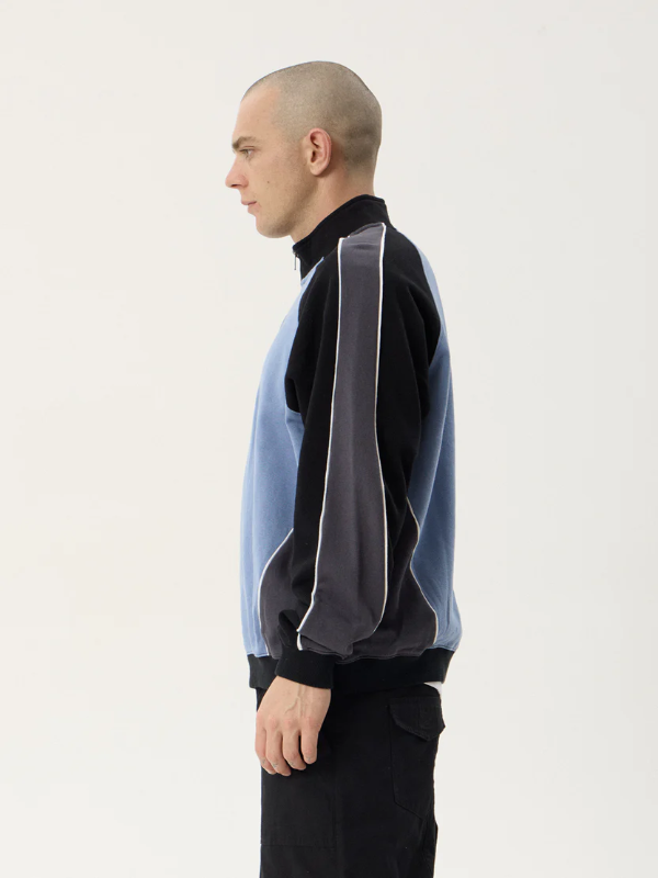 Afends Occupancy Paneled Quarter Zip Jumper unisex heavyweight fleece with a relaxed fit and quarter zip design.