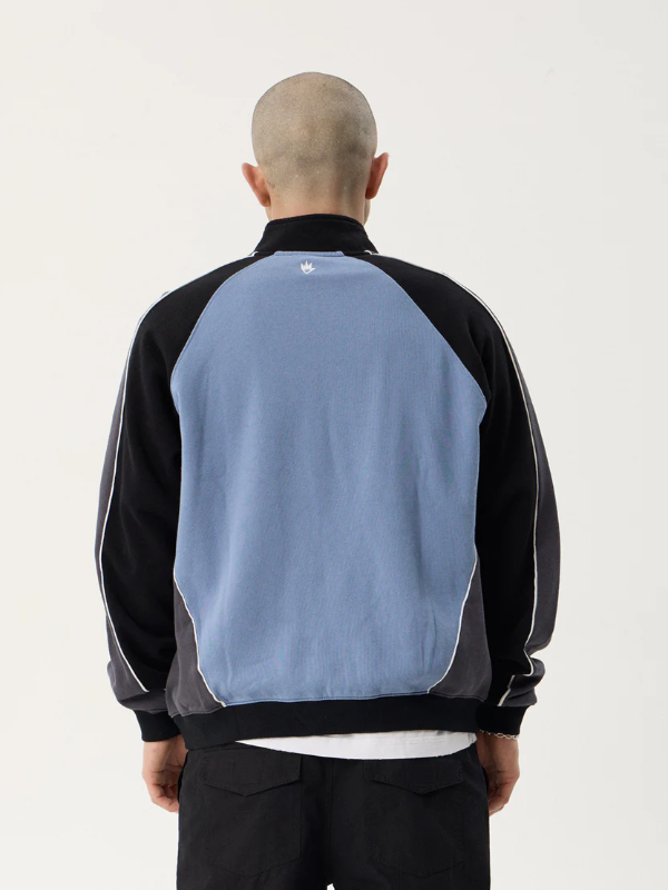 Afends Occupancy Paneled Quarter Zip Jumper unisex heavyweight fleece with a relaxed fit and quarter zip design.