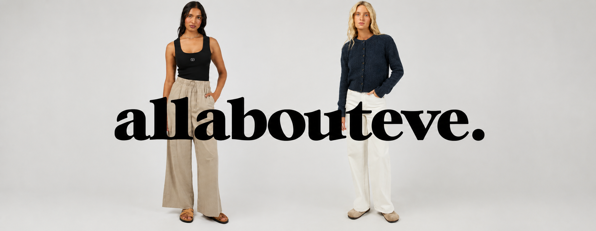 Two women wearing All About Eve clothing in a studio setting with All About Eve branding.