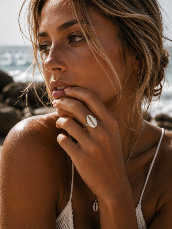 Handmade 925 sterling silver Cowrie Ball Ring featuring a detailed cowrie shell and ball design.