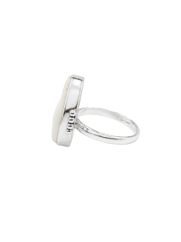 Handmade 925 sterling silver Cowrie Ball Ring featuring a detailed cowrie shell and ball design.