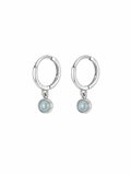 Handmade moonstone hoop earrings featuring natural moonstone detailing and a coastal-inspired design.