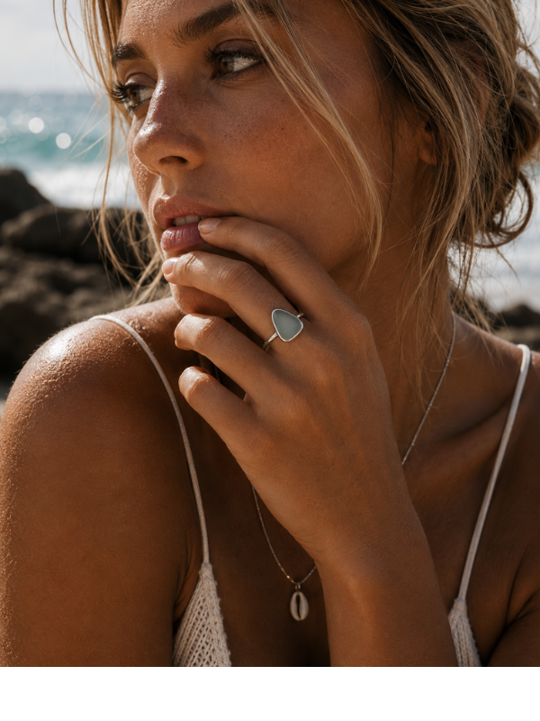 Handmade 925 sterling silver signet ring featuring natural sea glass with unique colour, shape and detailing.