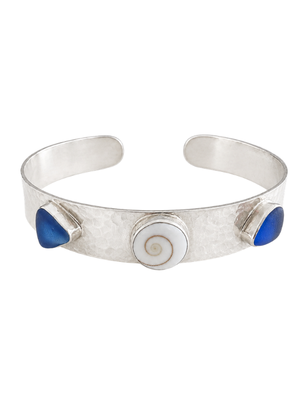 Handmade Shiva shell and sea glass bangle featuring natural coastal-inspired detailing.