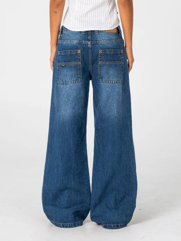 RUSTY RIP IN WENDY WIDE LOW RISE DENIM JEAN