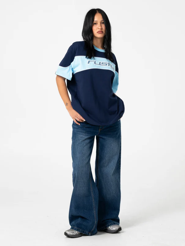 RUSTY RIP IN WENDY WIDE LOW RISE DENIM JEAN