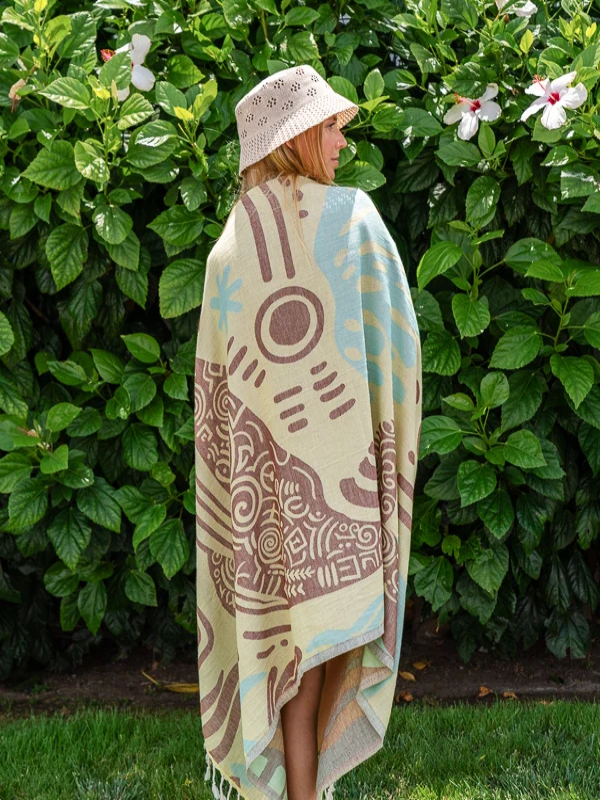 Sand Cloud Moby The Whale organic cotton beach towel featuring a coastal whale design.