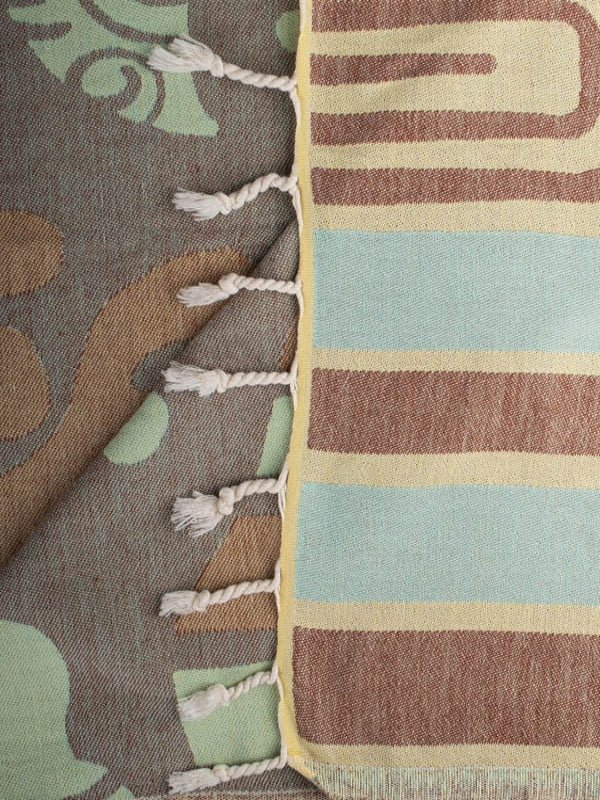 Sand Cloud Moby The Whale organic cotton beach towel featuring a coastal whale design.
