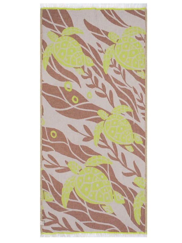 Sand Cloud Sargasso organic cotton beach towel featuring a coastal-inspired design.