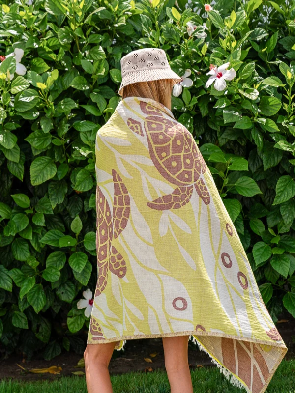 Sand Cloud Sargasso organic cotton beach towel featuring a coastal-inspired design.