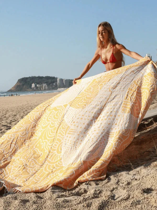Sand Cloud Whale Shark XL organic cotton beach towel with a whale shark design.